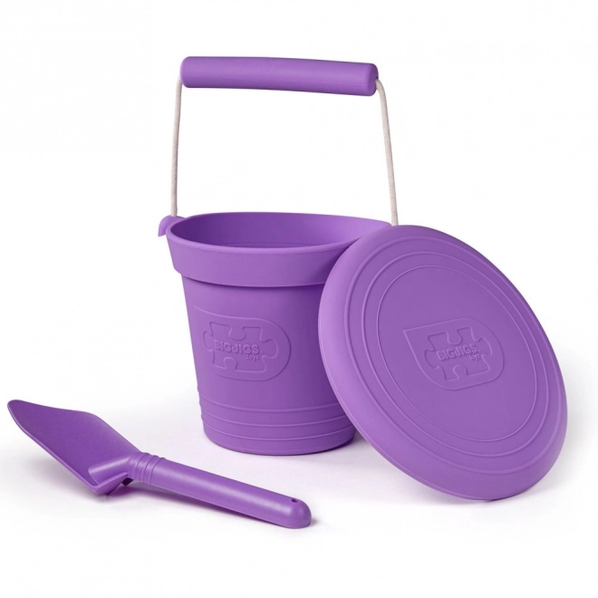 jucărie găleată plajă pliabilă violet de la Bigjigs Toys