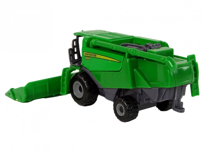 Combina agricolă cu secerătoare verde și galbenă