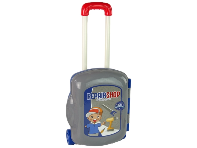 Trusă pe roți cu mâner telescopic