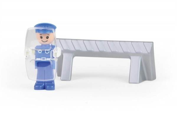 Figurină de polițist și barieră rutieră