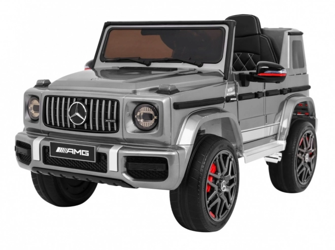 Mercedes AMG G63 pentru copii Vopsea argintie + telecomandă + MP3 LED + start lent + EVA + centuri