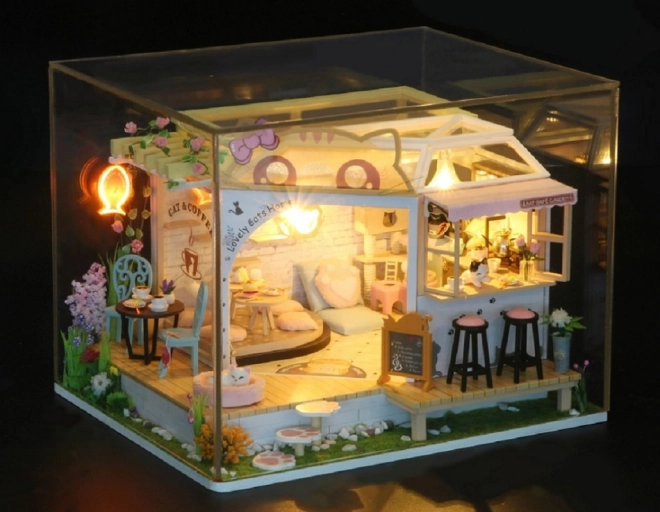 Miniatura căsuței cafenea pisicilor cu grădină