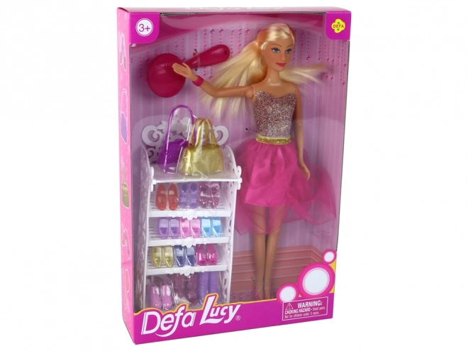 Păpușa Lucy cu rochie roz sclipitoare și set de pantofi