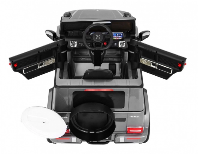 Mercedes AMG G63 pentru copii Vopsea argintie + telecomandă + MP3 LED + start lent + EVA + centuri
