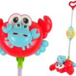 Crab luminiscente jucărie de împins cu muzică