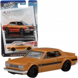 Hot Wheels Nissan Skyline 1971 HT 2000 GT‑R 1:64 mașinuță portocalie 7 cm