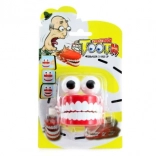 Dinți glumeți cu mecanism de întoarcere pe blister