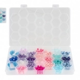 Mărgele colorate din plastic cu șnur într-o cutie