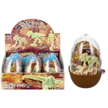 Schelet de dinozaur care strălucește în ou din plastic – set de construcție colecționabil