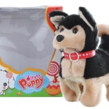 Căţeluş negru mergător pe baterii