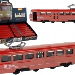 Trenul roșu din metal cu propulsie prin frecare și sunete